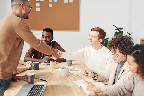 a group of people collaborating in conference room